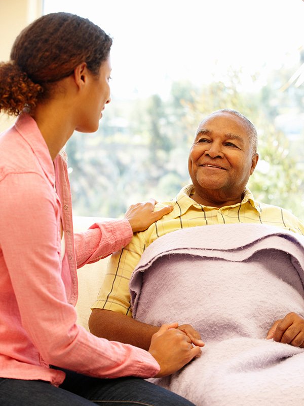 Elderly Man with caregiver