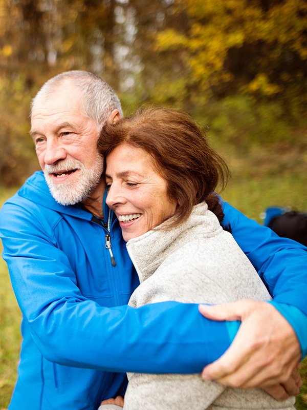 Elderly Couple hugging
