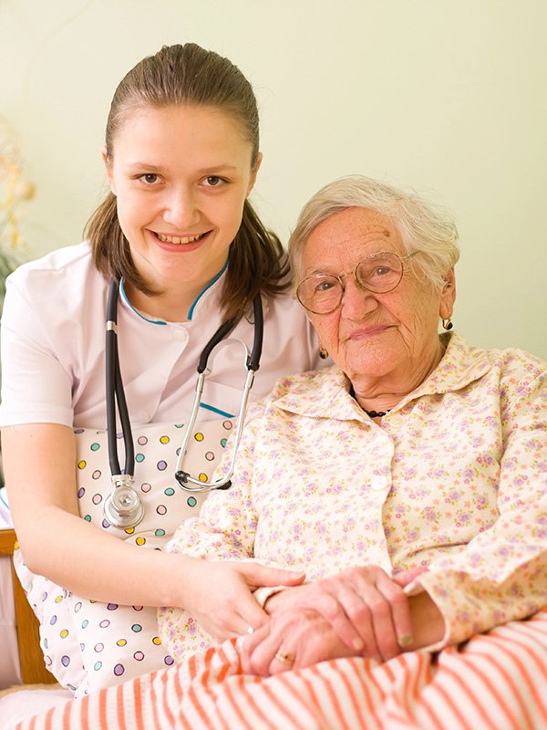 Caregiver and elderly woman