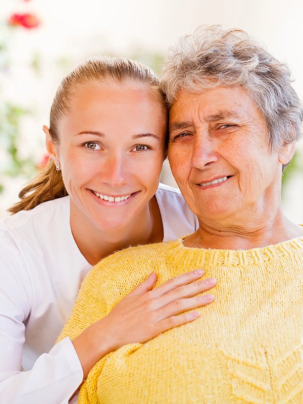 Caregiver and elderly woman