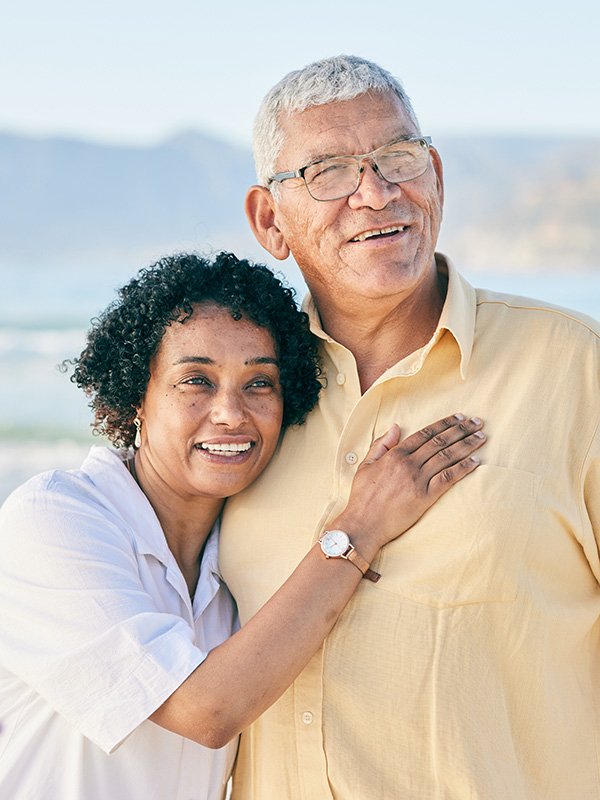 Elderly couple on beach