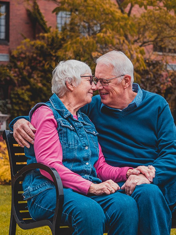Elderly couple on bench